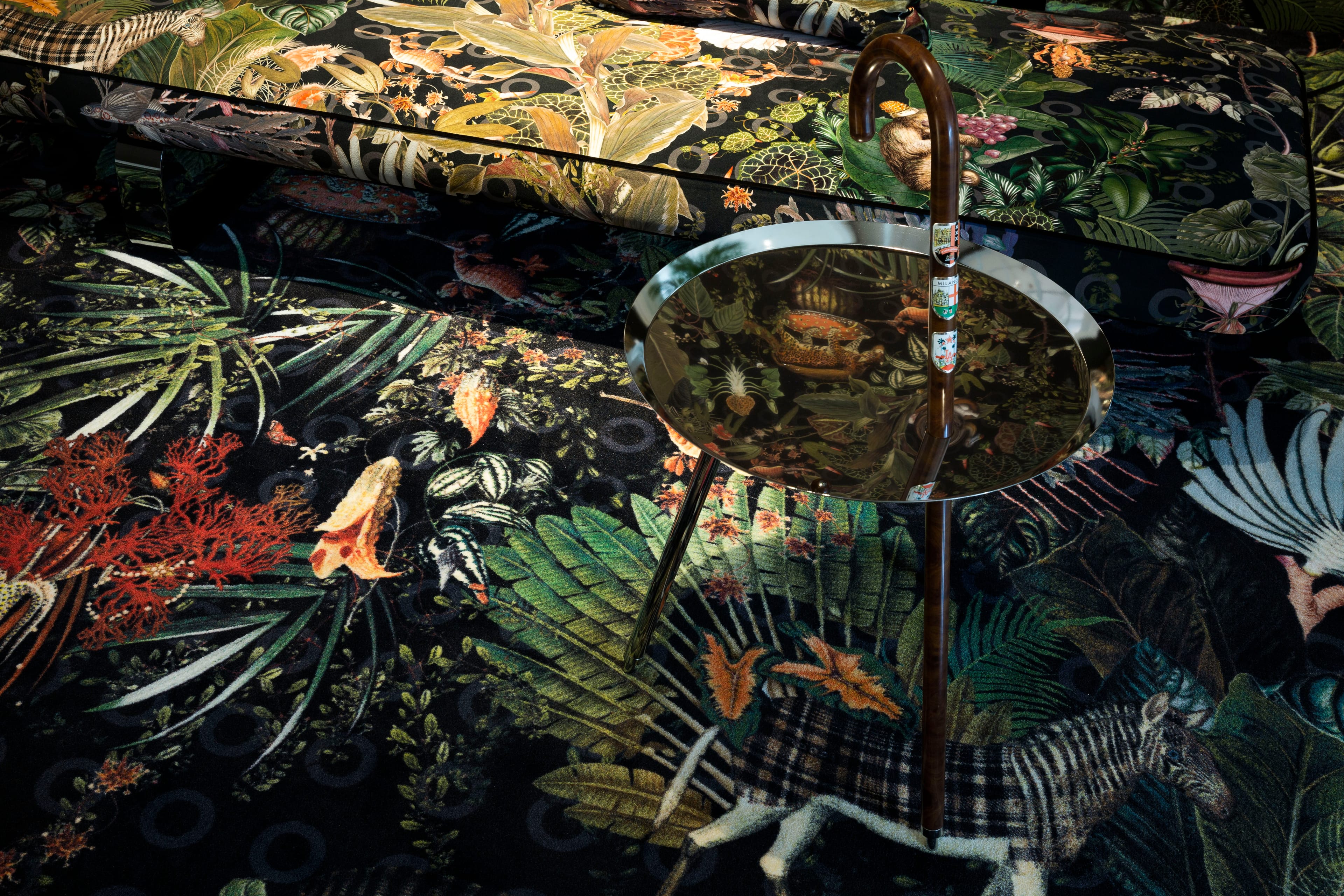 Menagerie of Extinct Animals Raven on carpet and Power Nap sofa