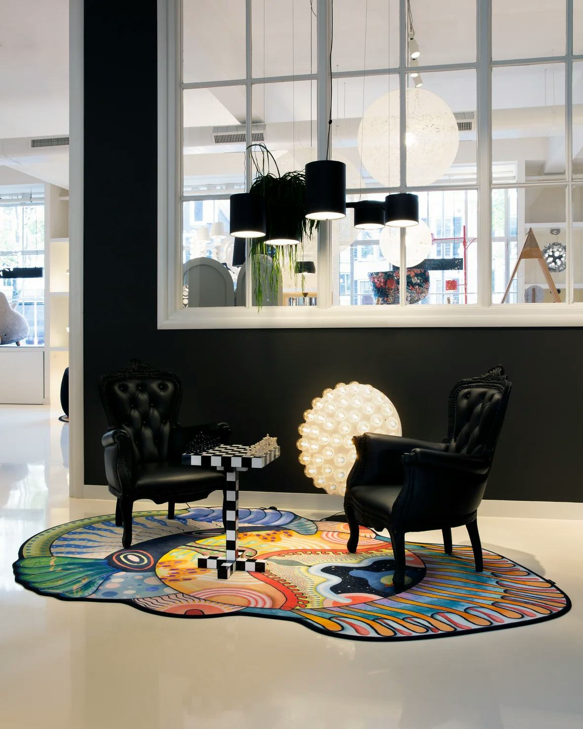 Interior of Amsterdam Showroom 2020 with Smoke Armchair, Chess Table and Prop Light Round Floor