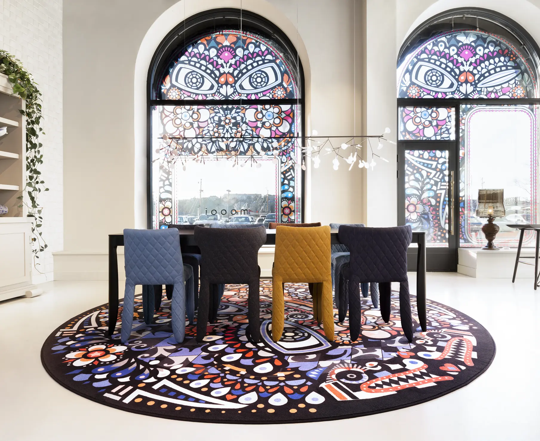 Monster table, chairs and carpet in a dining setting