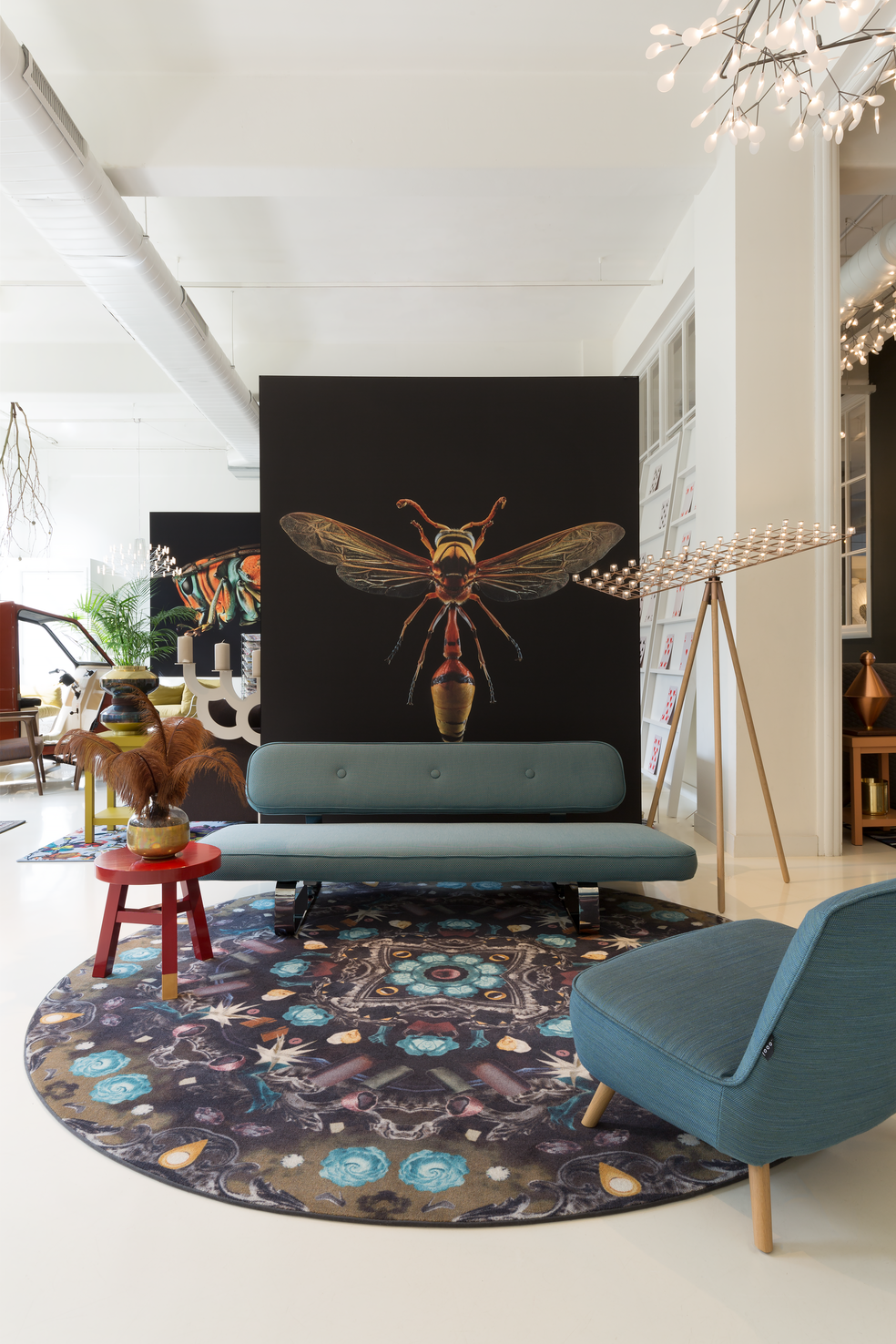 Interior of Amsterdam Showroom 2017 with Powernap Sofa and Space Frame floor lamp
