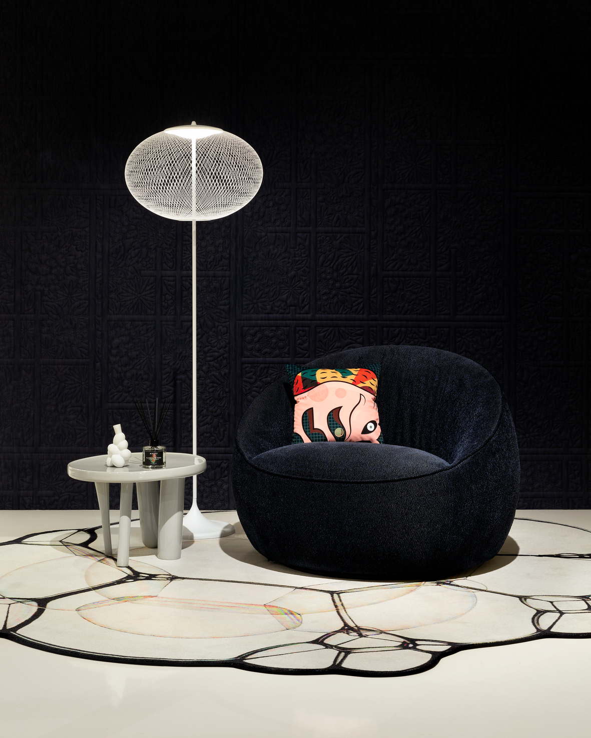 Interior of Amsterdam Showroom 2020 with NR2 floor lamp, Hana Armchair and Bubble carpet
