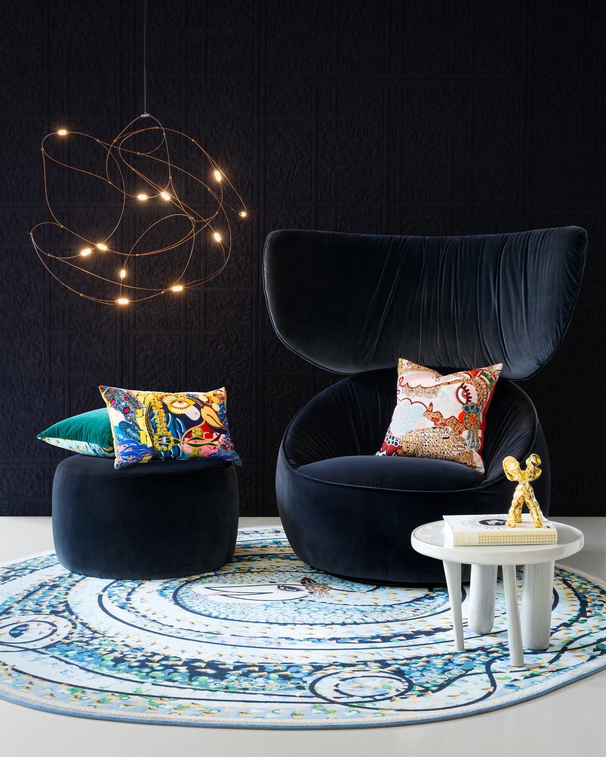 Hana Wingback chair in set with flock of light Elements table and Bisanto carpet and pillows