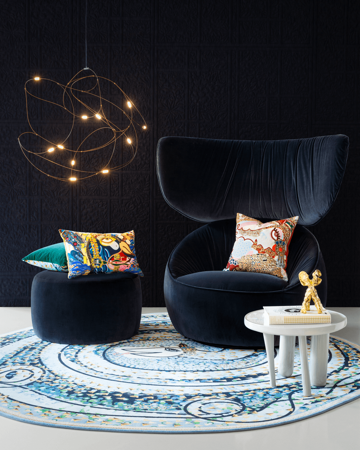 Hana Wingback chair in set with flock of light Elements table and Bisanto carpet and pillows