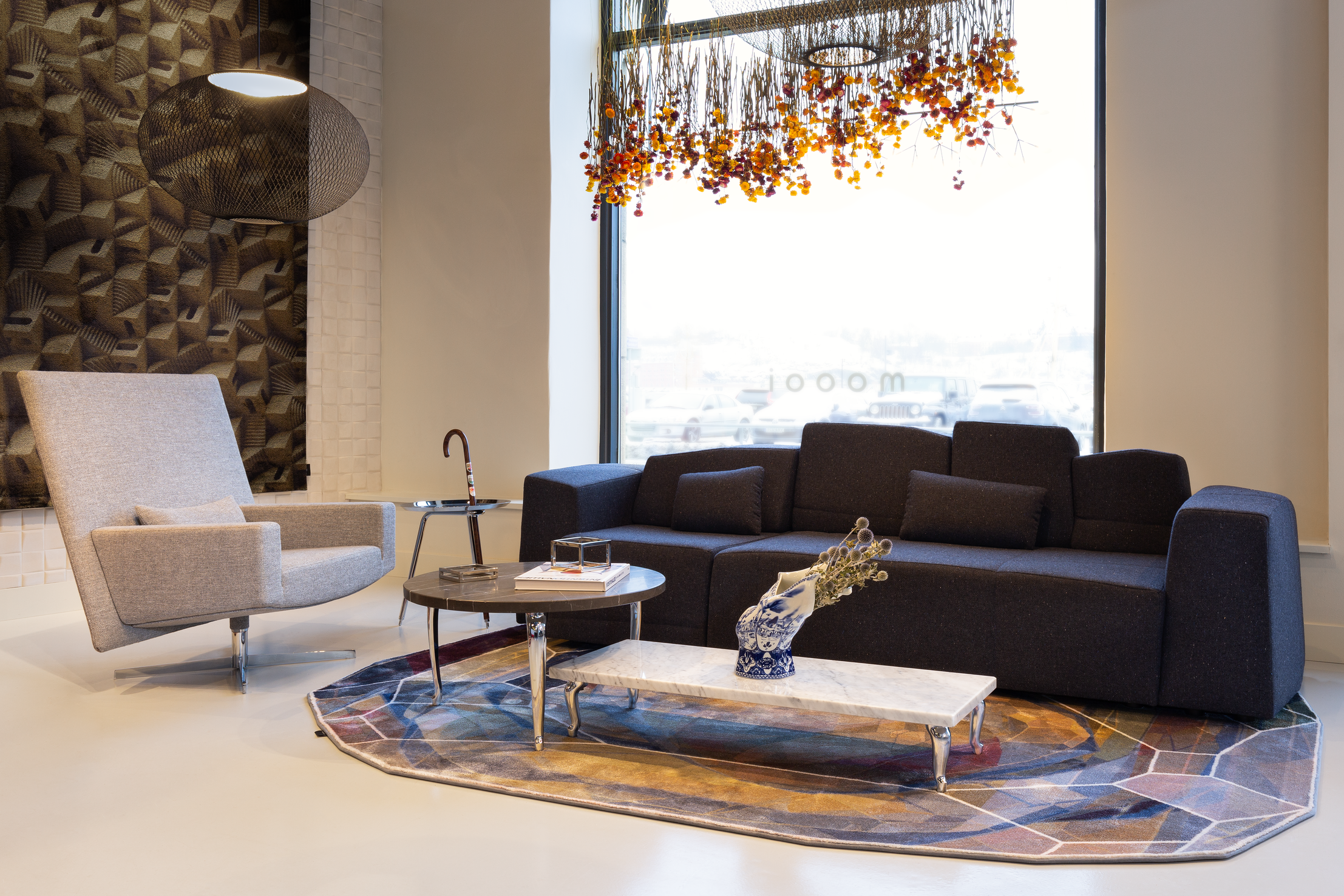 Interior of Stockholm showroom with SLT Sofa, Jackson Chair and Bassotti Coffee Table