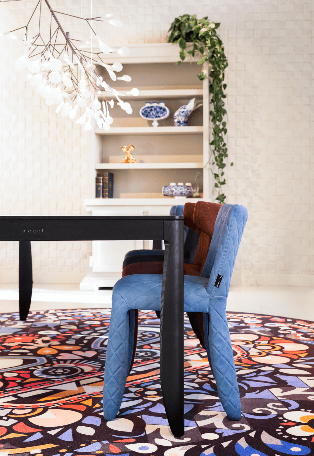 Monster Chairs under the Monster table on a monster carpet in a dining setting