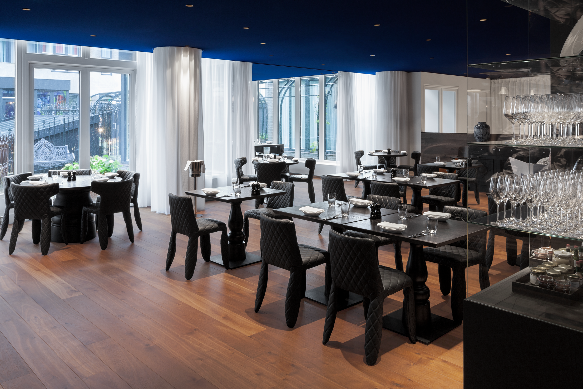 Interior of Andaz Amsterdam with Monster Dining Chair and Container Table
