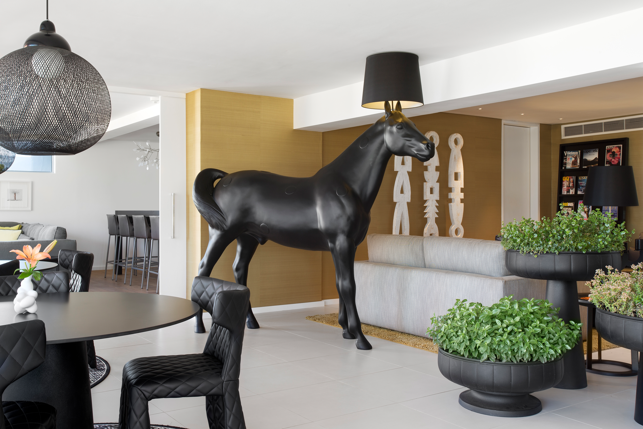 Interior of ZA Clouds with Horse Floor Lamp, Non Random suspension light and Monster Dining Chair