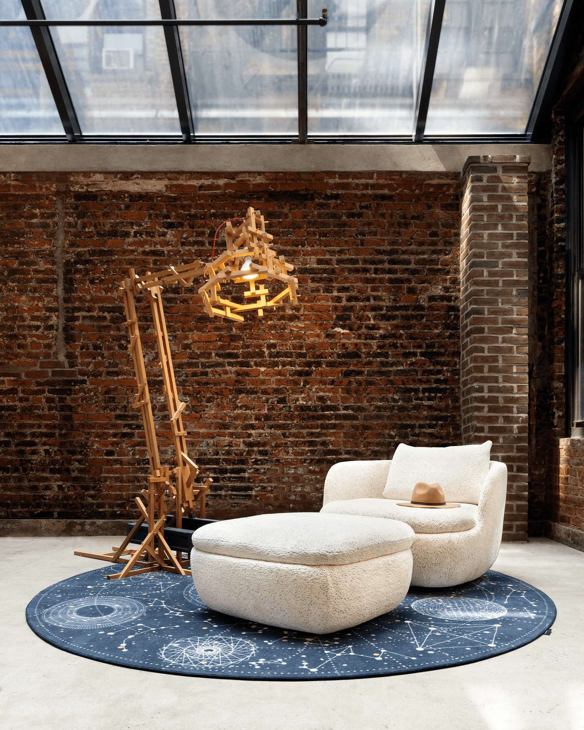 Bart armchair and footstool set in Extinct animals fabric of the Dodo Pavone at our brand store in New York