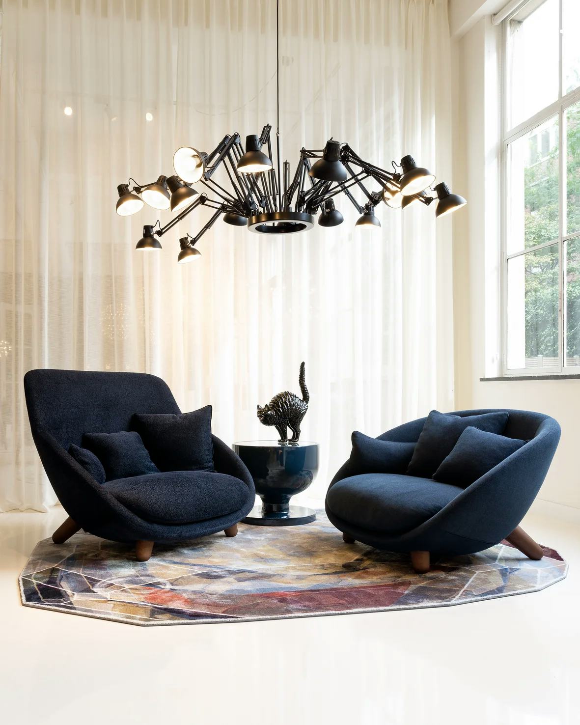 Carpet Crystal brown in interior with Love Sofa and Dear Ingo suspension 