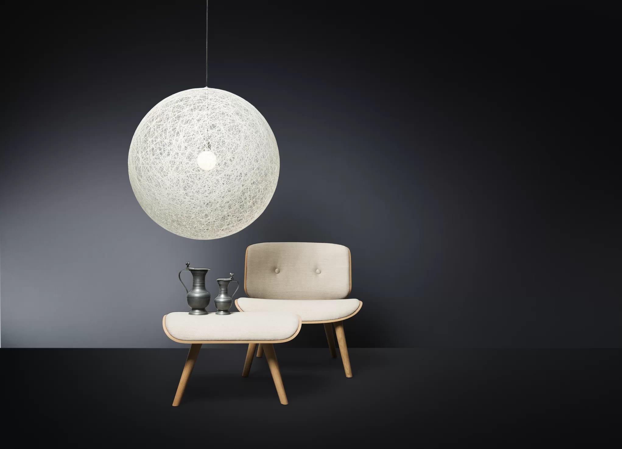 Poetic composition Random Light suspension, Nut Armchair and Nut Footstool