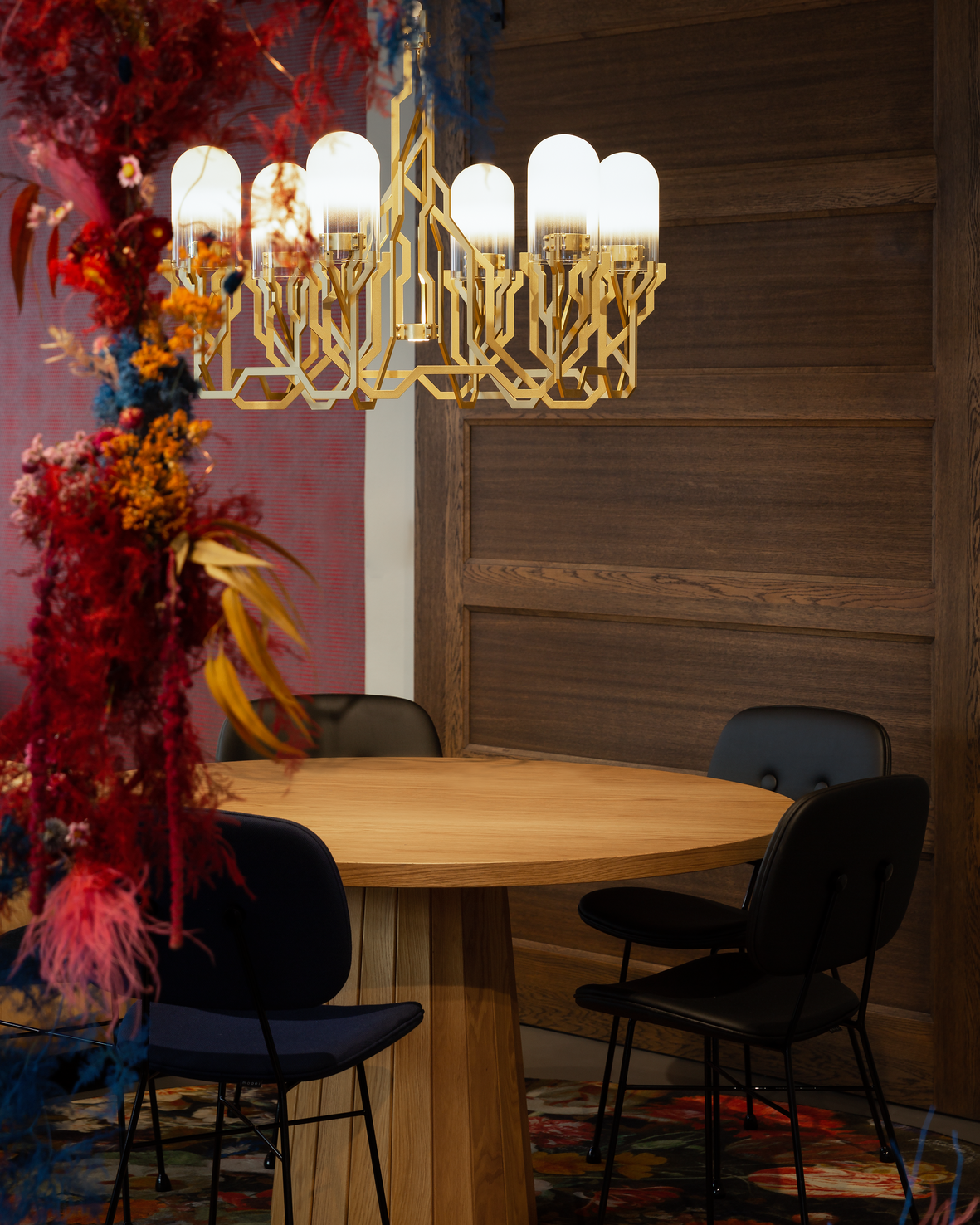 Interior of London Showroom with Plant Chandelier, Container Table and The Golden Chair with flowers