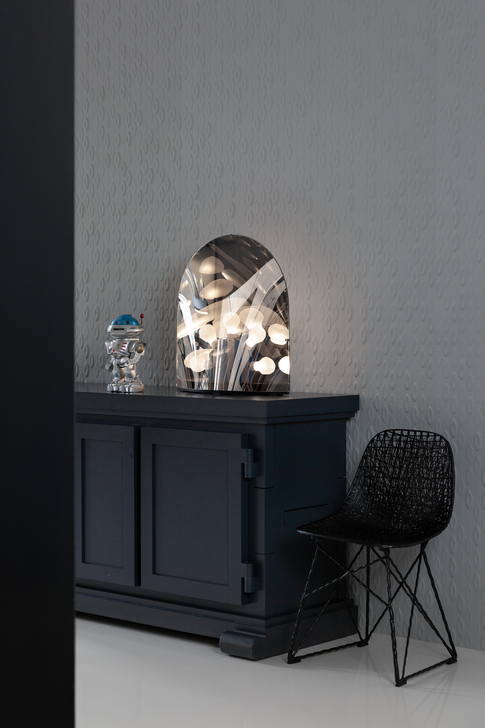 Space Table Lamp white light on cabinet