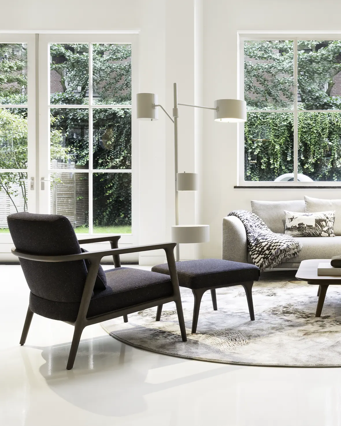 Interior of Amsterdam Brand Store with Zio Lounge Chair and Statistocrat Floor Lamp